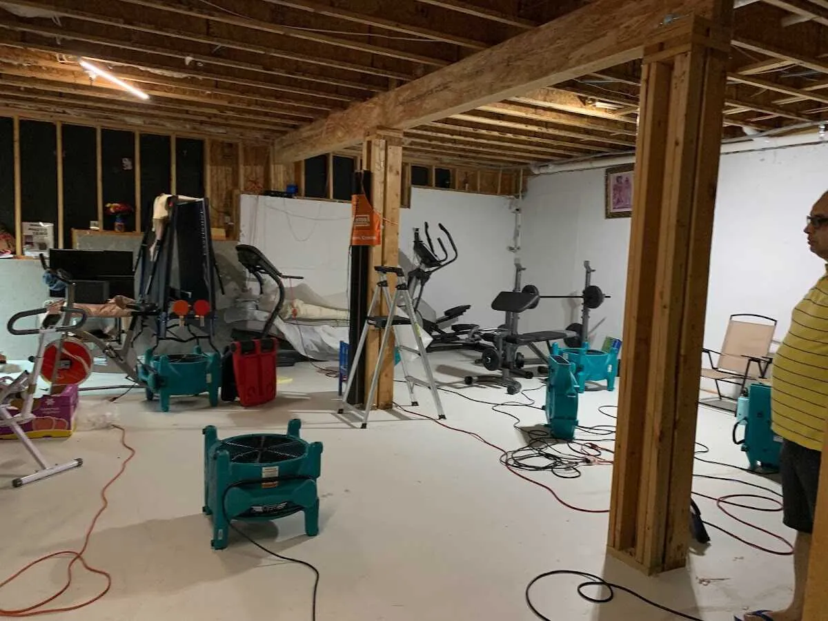 Basement drying equipment setup for Contents Cleaning & Restoration in Elkins